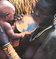 African mother holding child